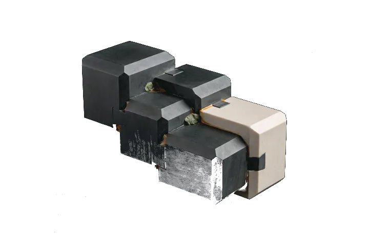 Interlocking ceramic and graphite components with precise joints.