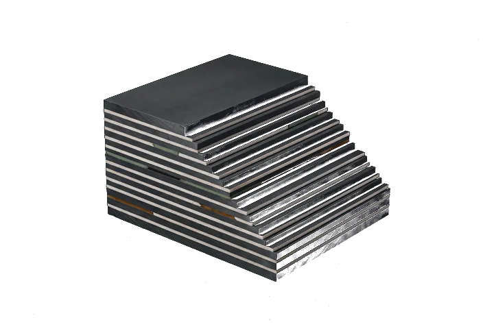 Stacked precision-cut graphite and mineral planes.